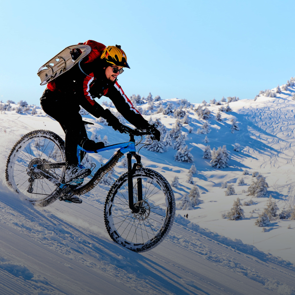 Michel mountain biking in the snow