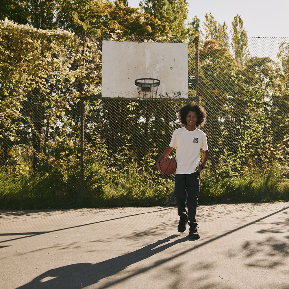 Boy on a basketball court